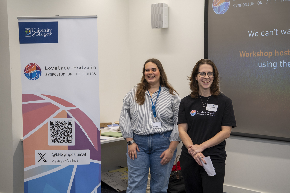 Lovelace-Hodgkin Symposium on AI Ethics picture of two presenters 
