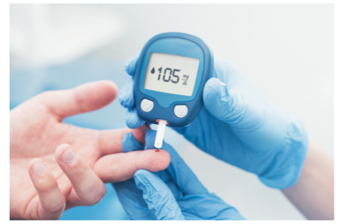 Image of hand receiving insulin test