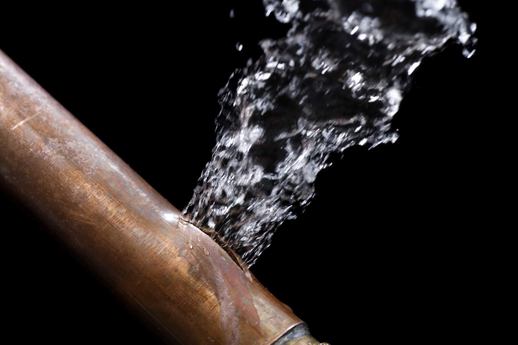 Water bursts through copper water-pipe