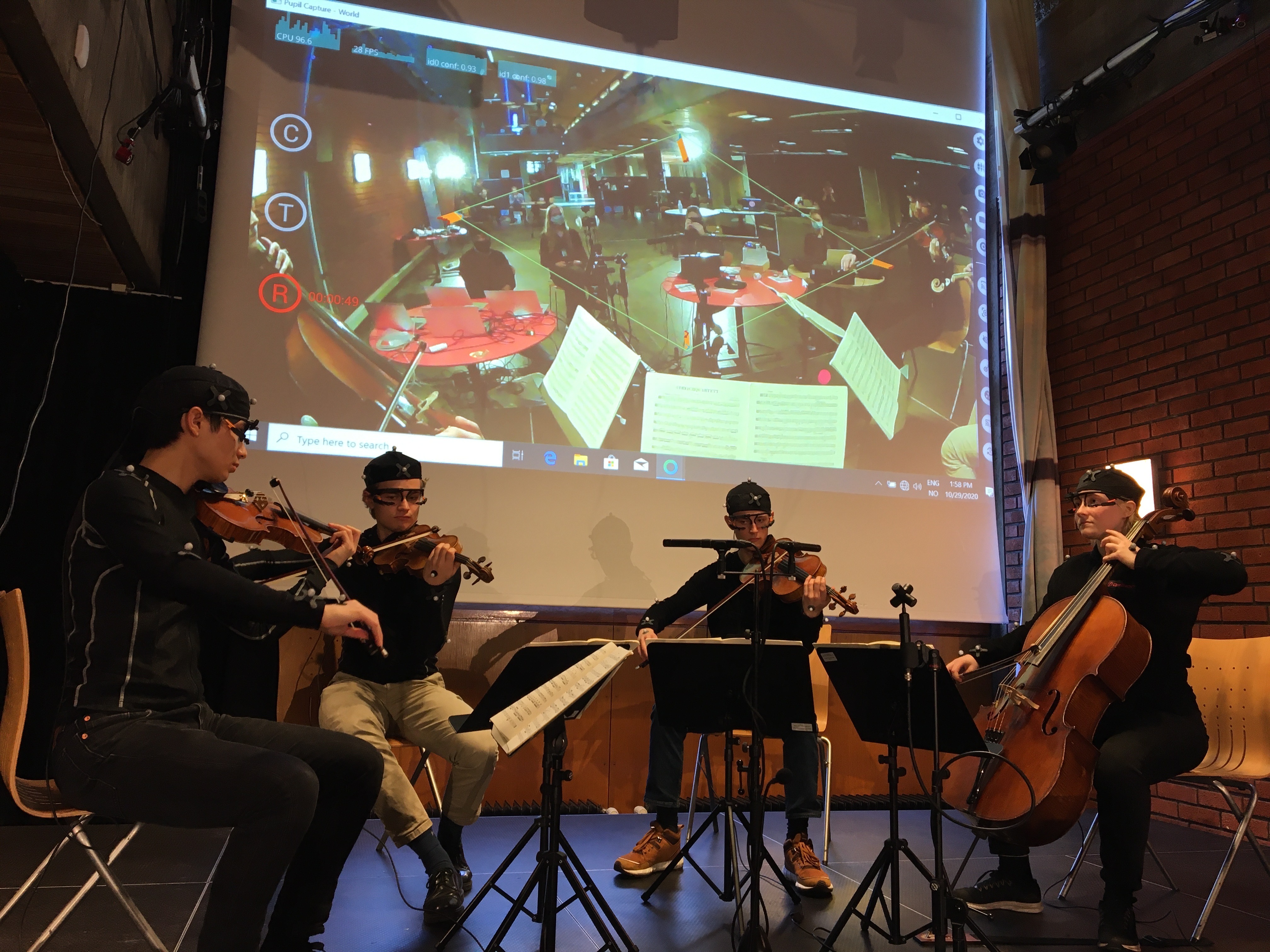 String quartet performing on stage.