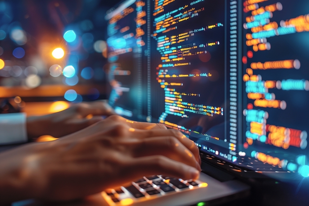 Computer Programmer Using Development Software