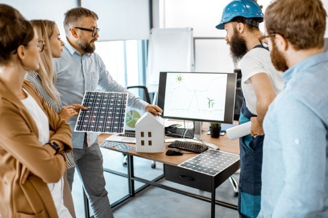 Community team working on clean energy project.