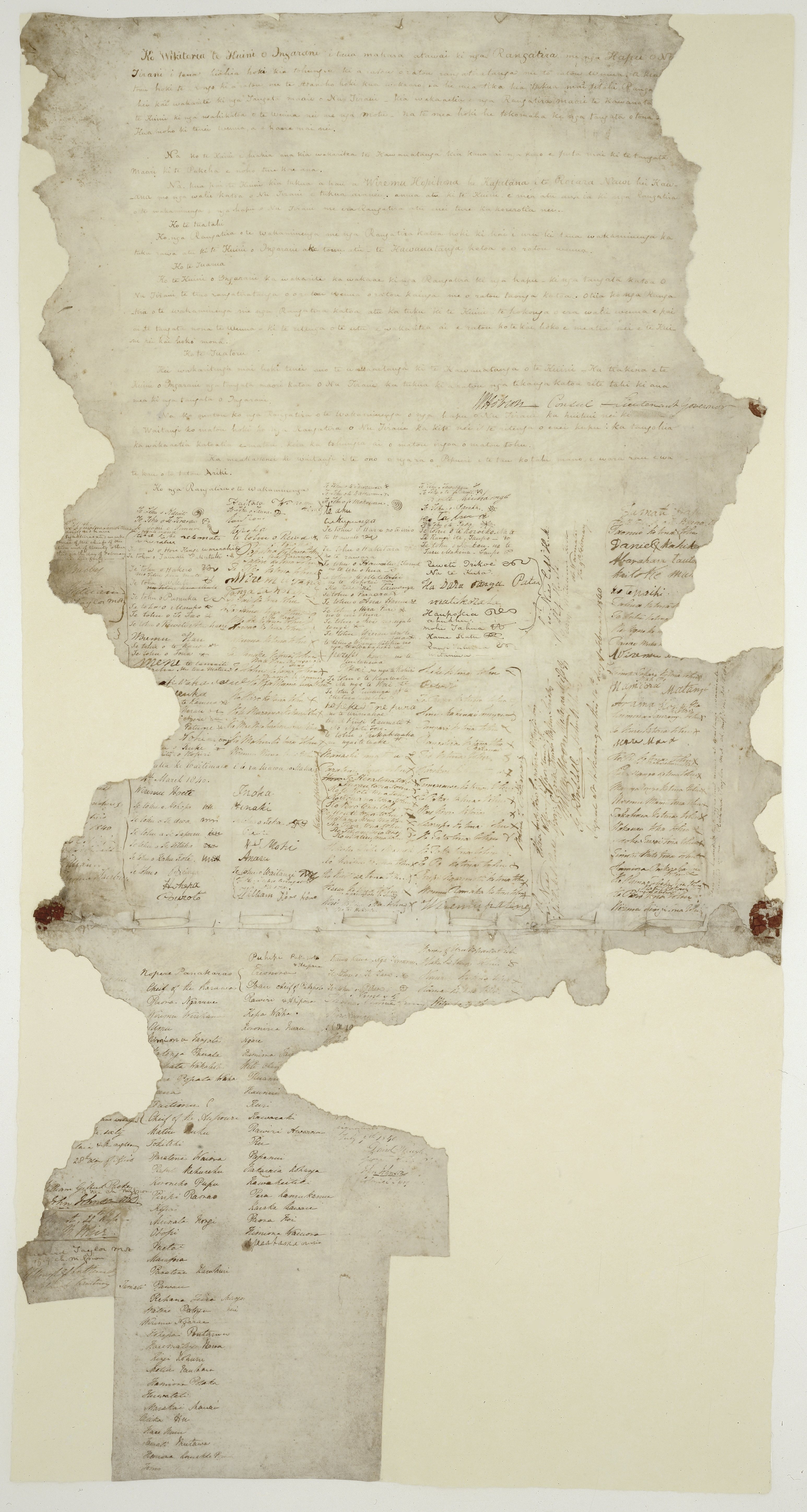 An old document, damaged and faded. It contains several long handwritten passages, then many blocks of signatures