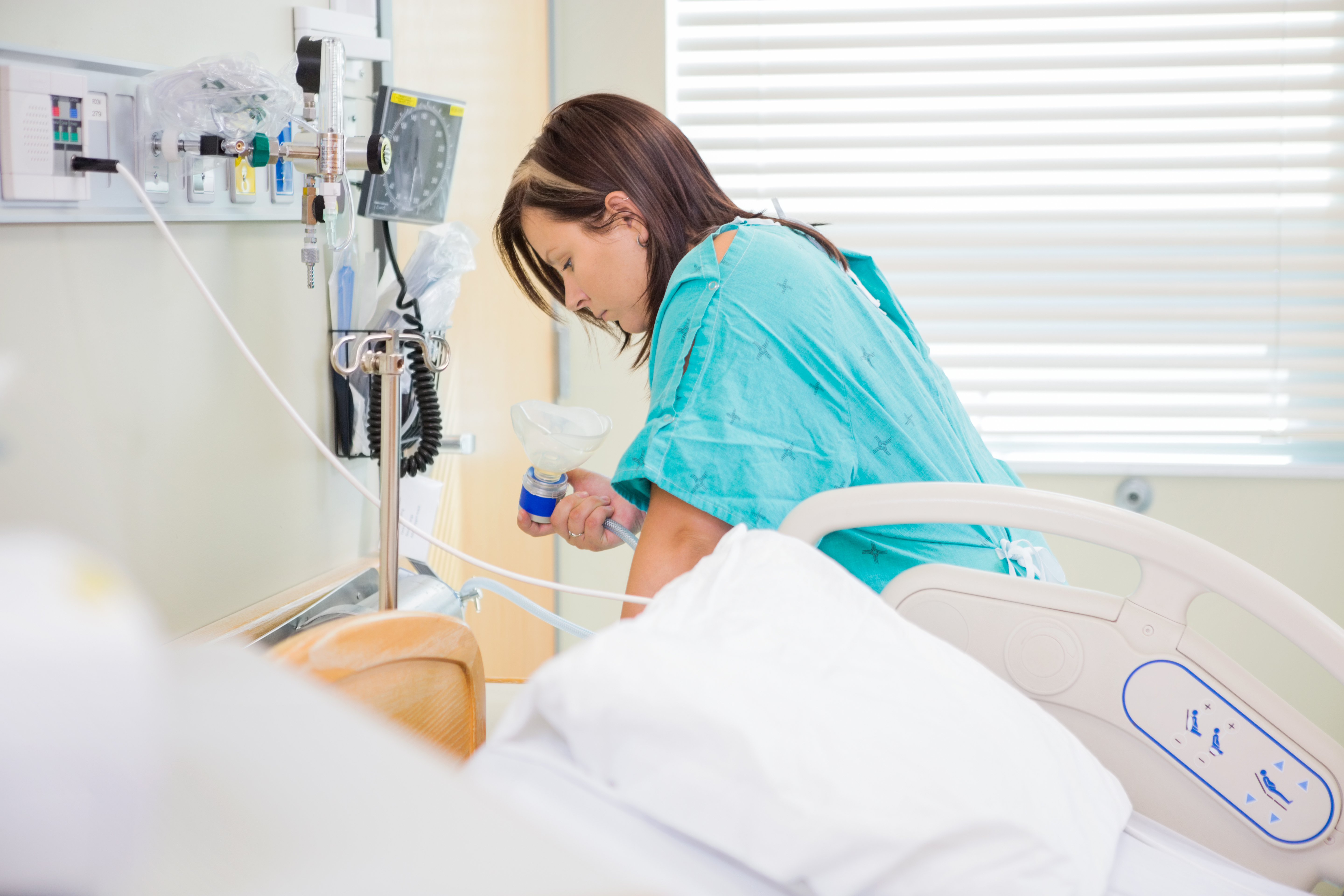 a woman using entonox