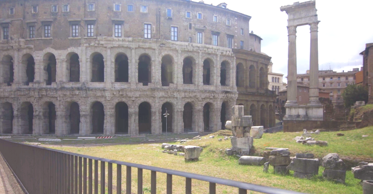 A large stone and brick apartment block