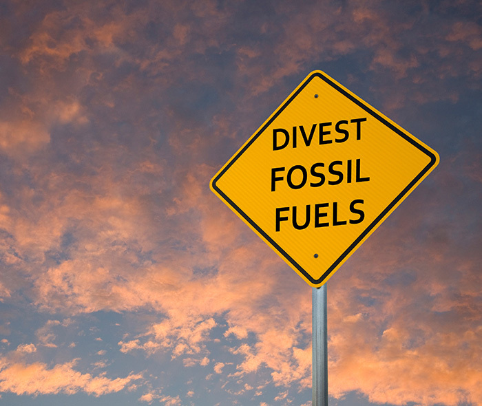Sign saying "Divest from fossil fuels".