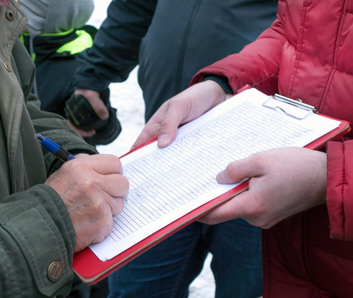 A person signing a petition. 