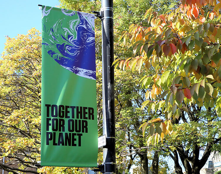Together For Our Planet banner at climate summit.
