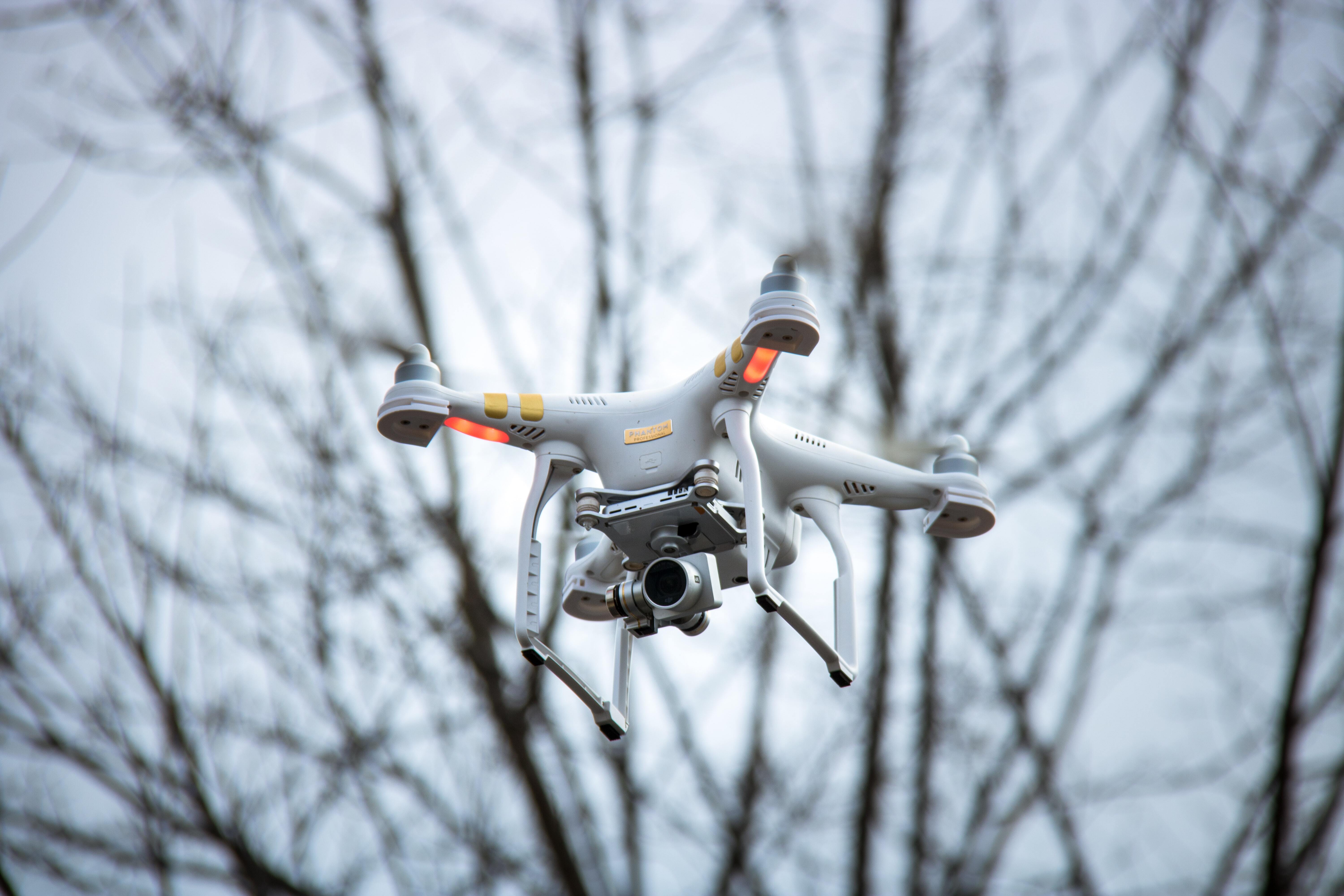 a drone near trees