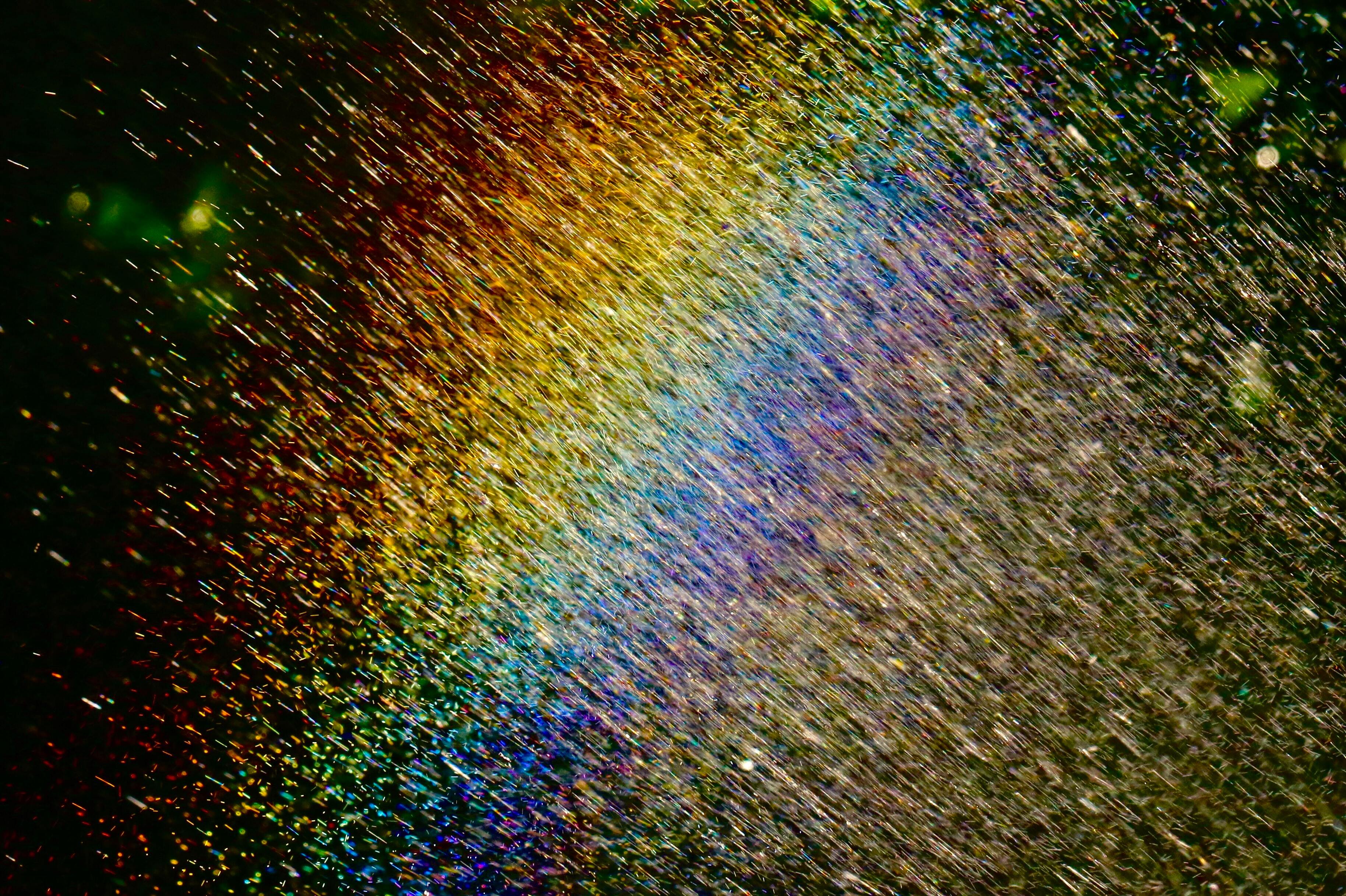 Rainbow colours reflected on the ground