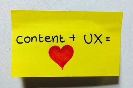 a post-it note saying 'content + UX = love'