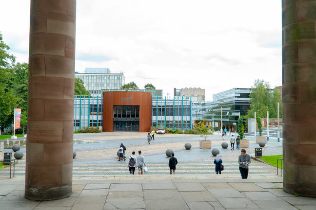 Students walking in the quad at Coventry University