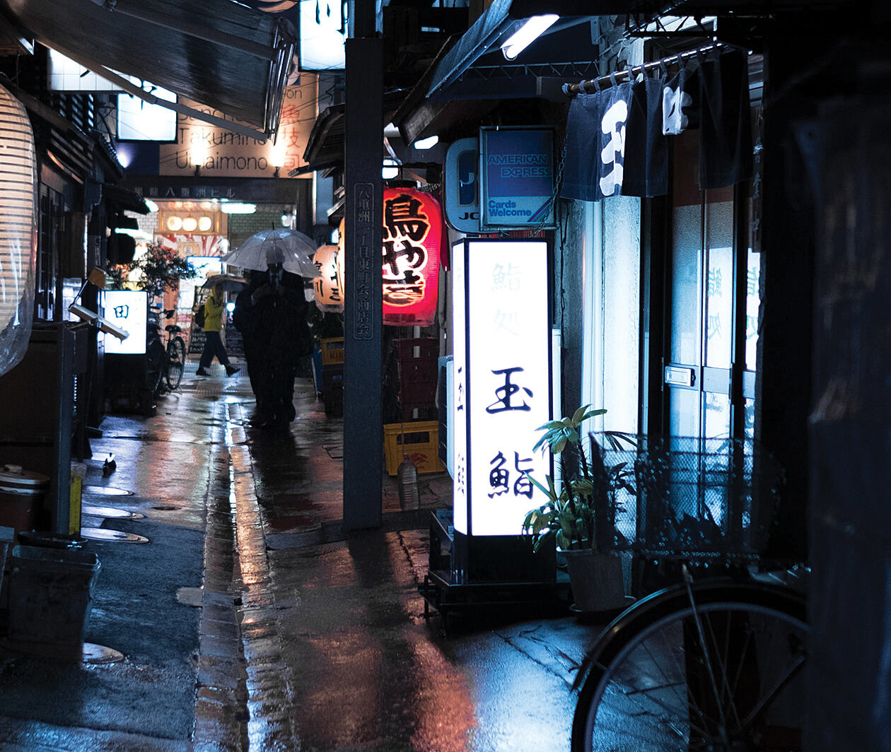 A rainy night in a small dark alleyway