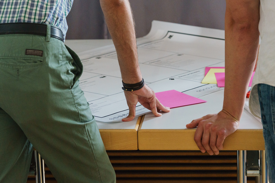 People gathering round ideas board