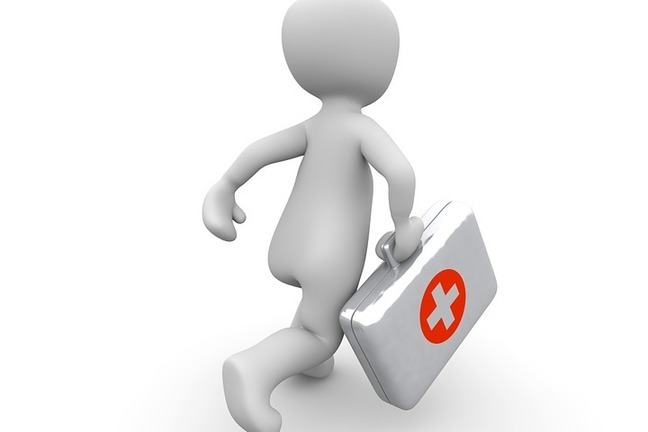 Figure carrying first aid case