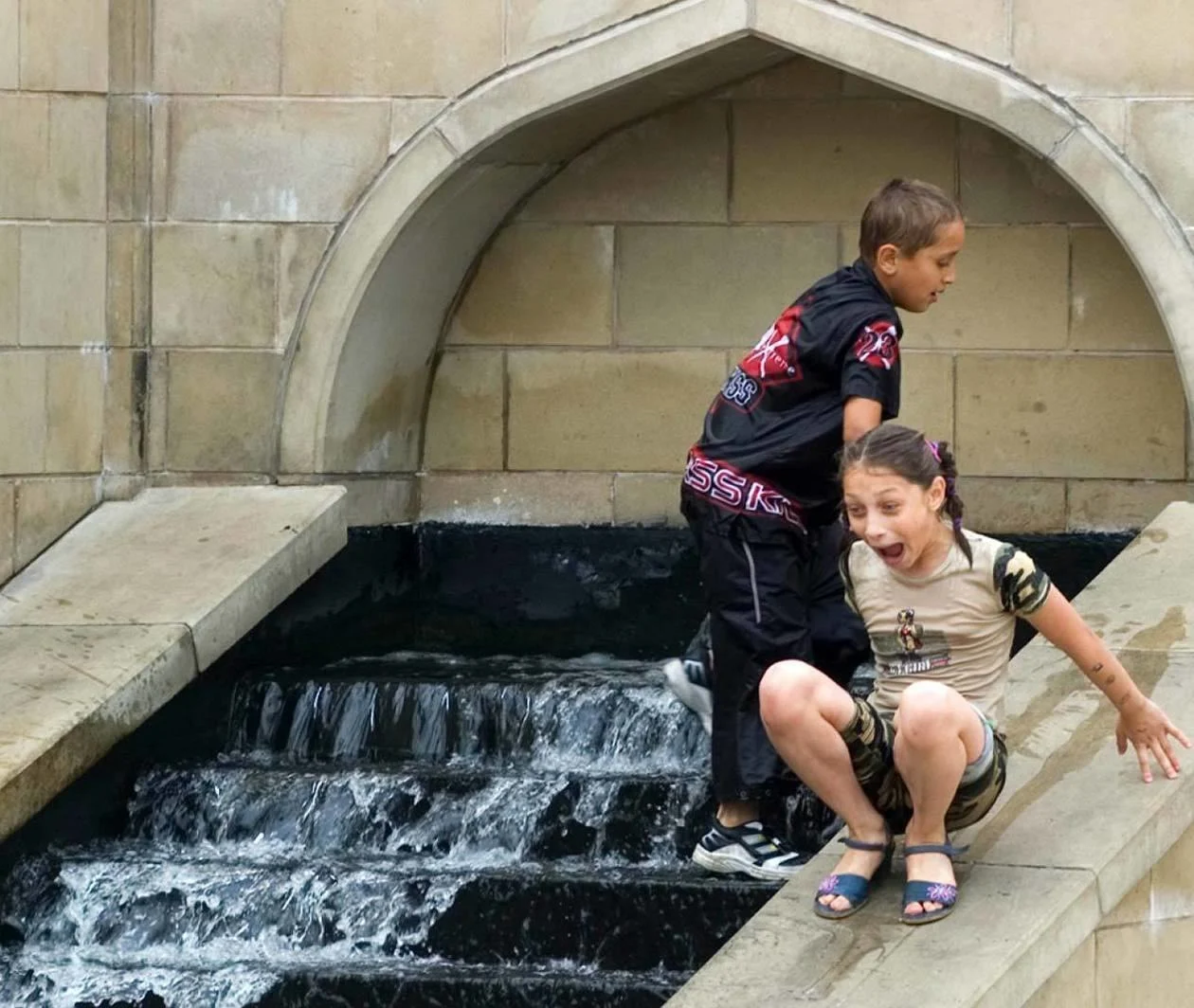 Children playing in the Mughal Garden, Bradford. Peter Sanders www.artofintegration.co.uk