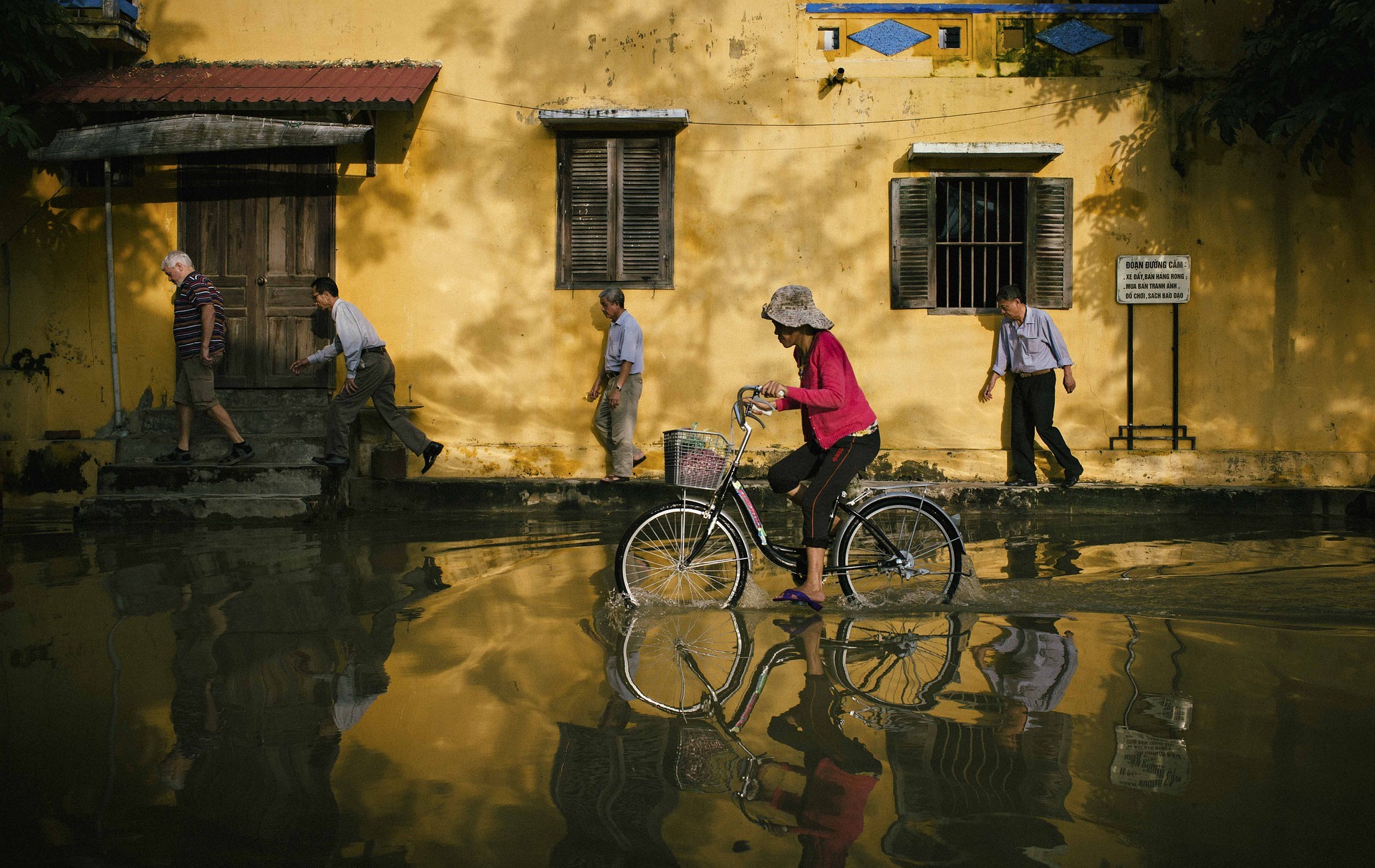 Man biking in high water