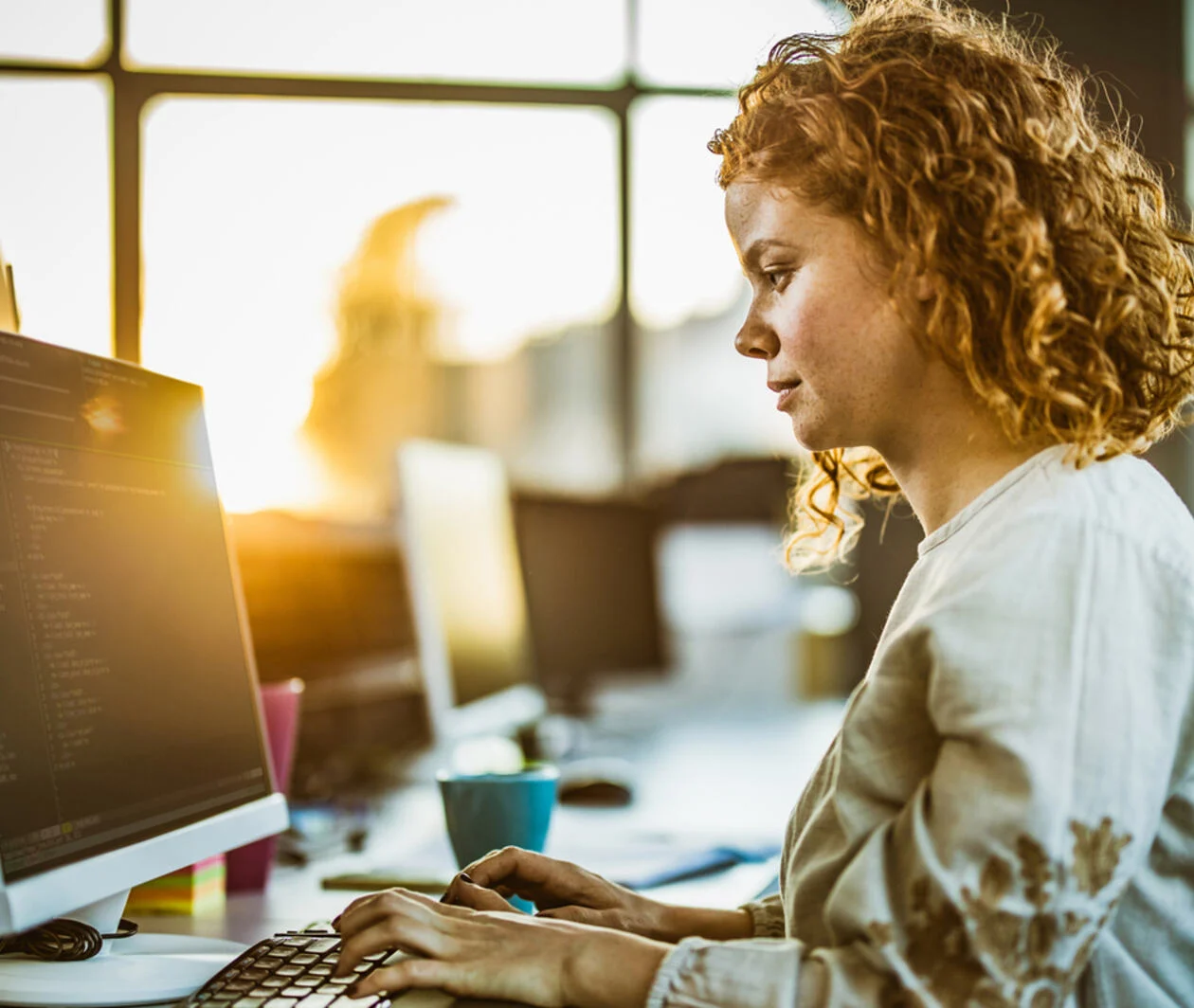 Women looking at computer