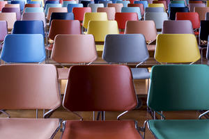 Rows of multicolour chairs