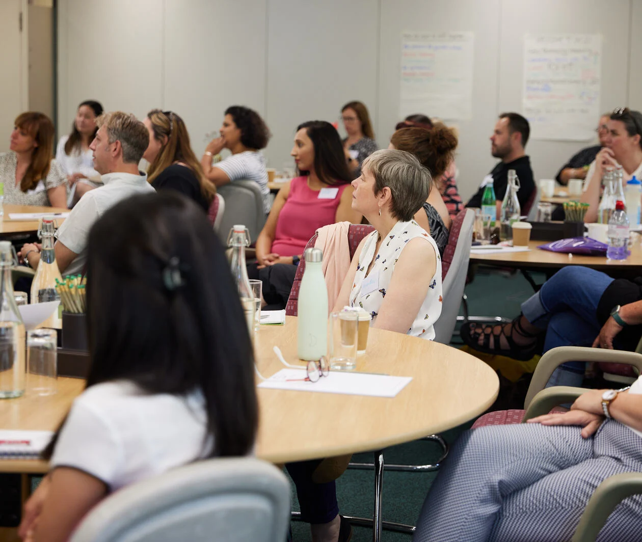 Participants of leadership programme all facing forward