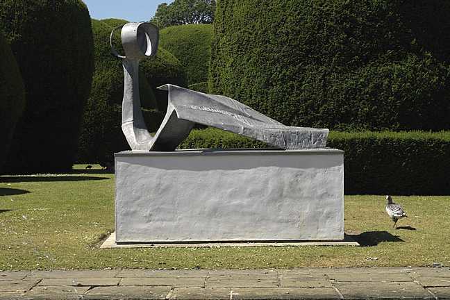 A photograph of Austin Wright's Dryad facing the Quiet Place gardens. It is a cloudy day.