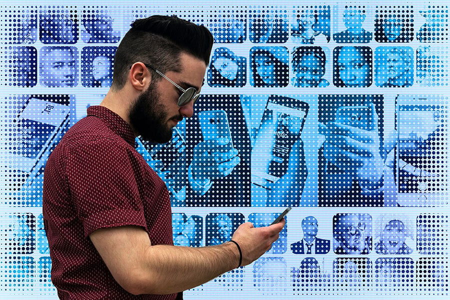 Man holding his phone with digital images