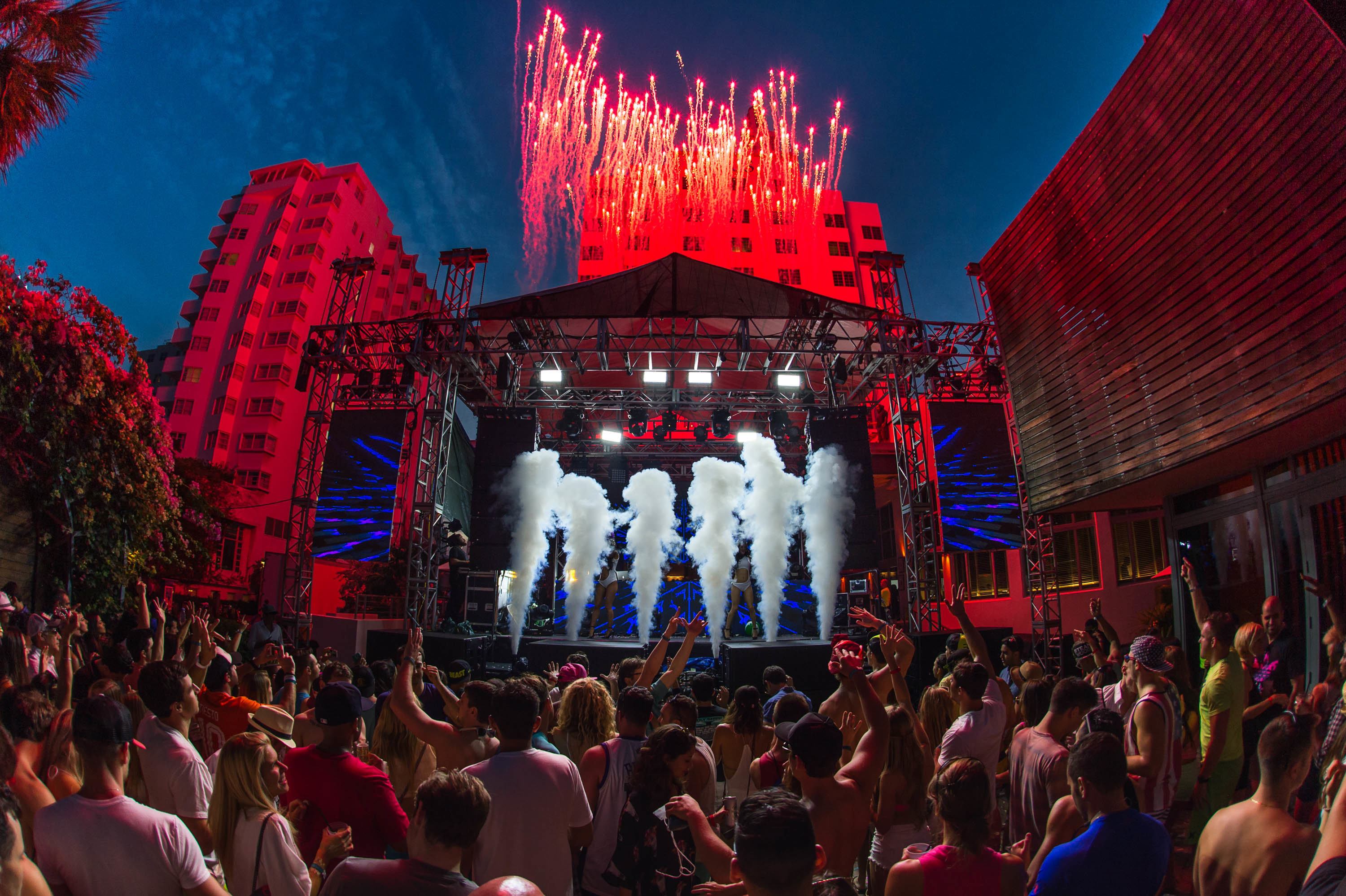 Pop concert stage; lights, smoke, crowd