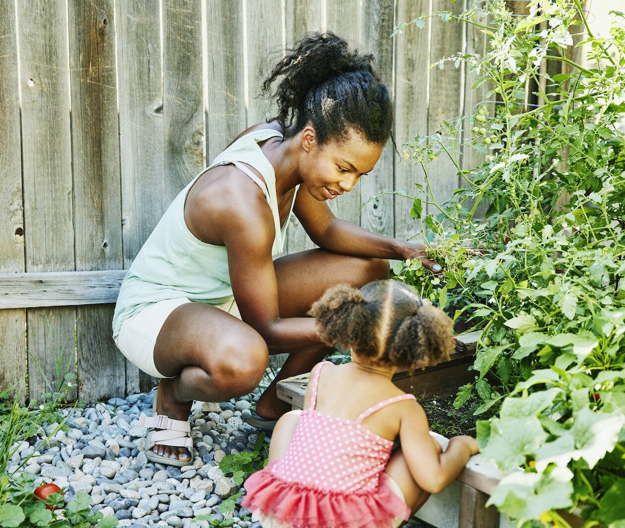 Mother and Daughter Gardening Together