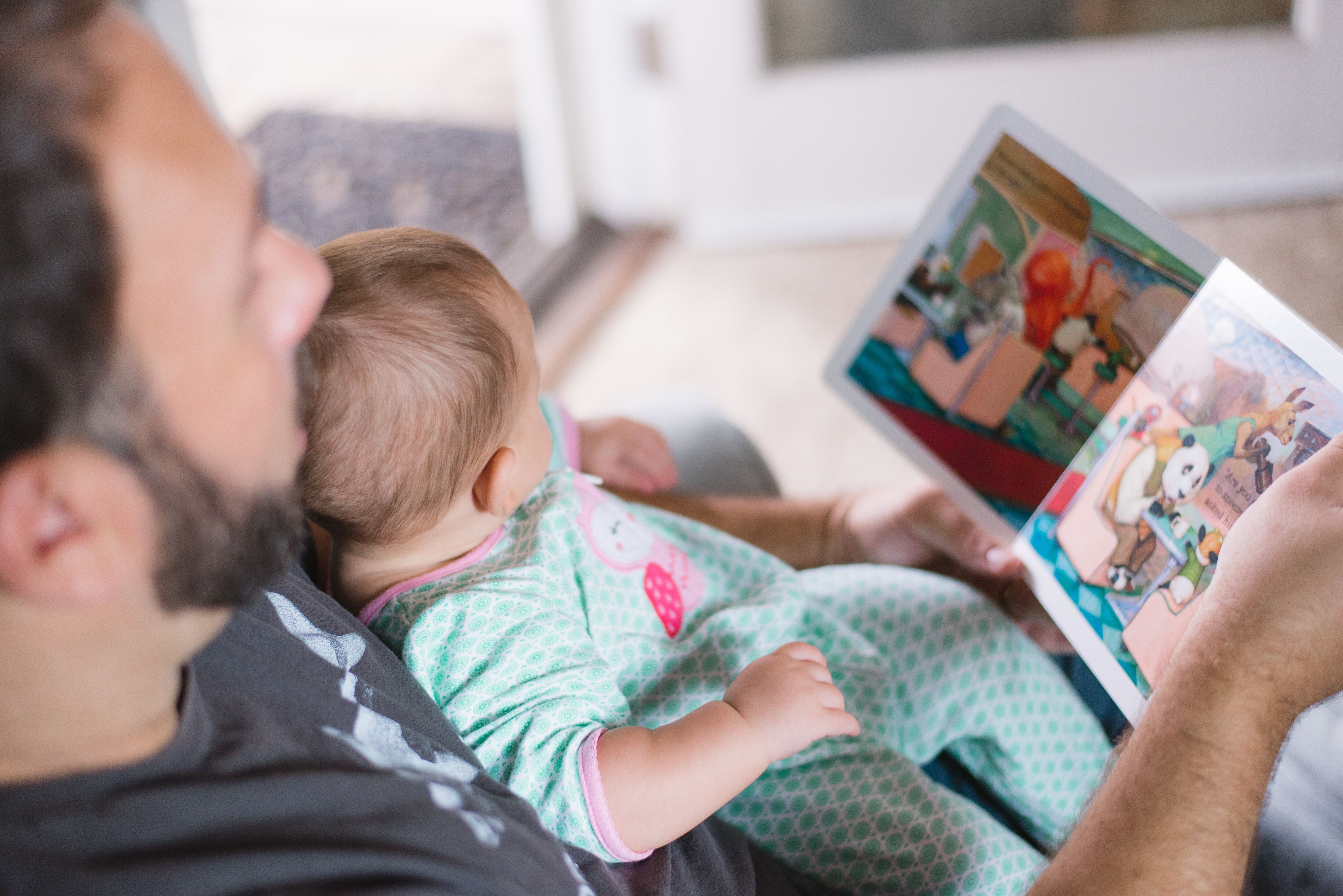 Child and parent reading