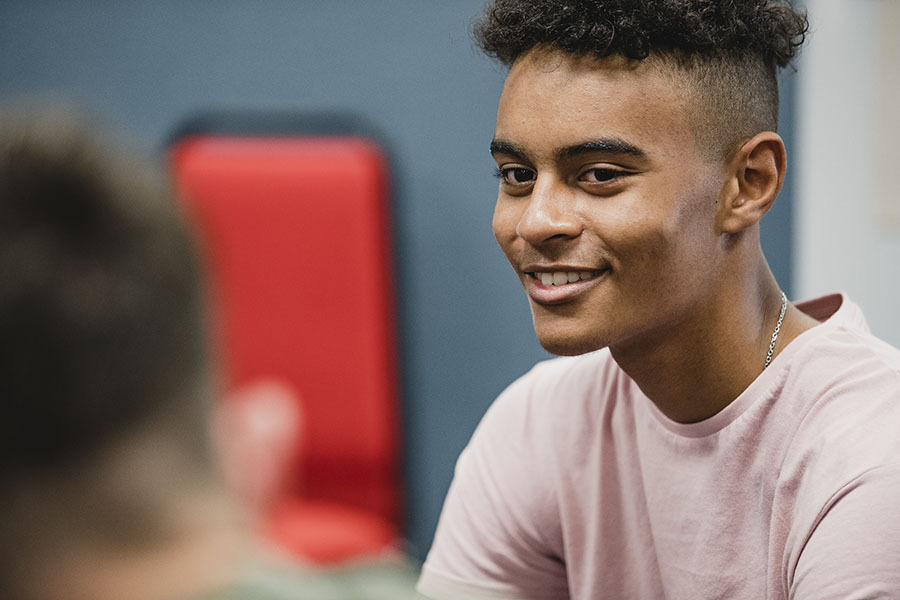 Boy smiles to camera