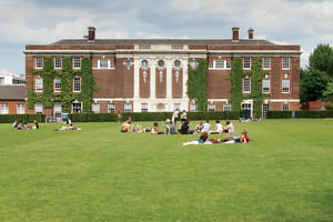 Students relaxing on the university green