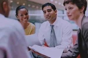 A group of business professionals communicating effectively