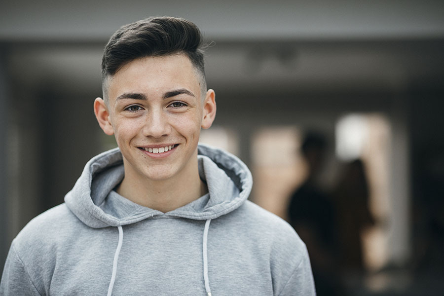 Young man smiling to camera