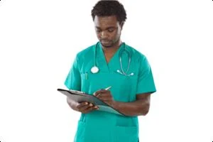 A veterinarian makes notes on a clipboard.