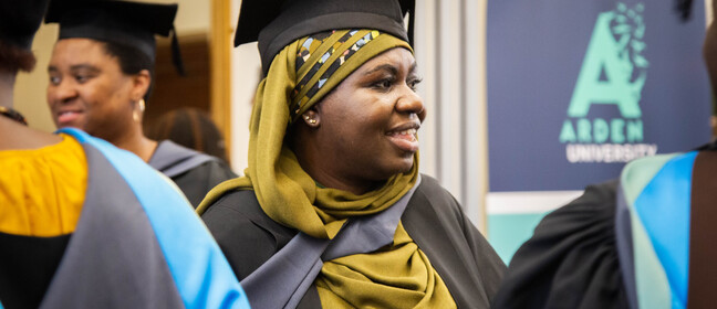 A smiling student on graduation day