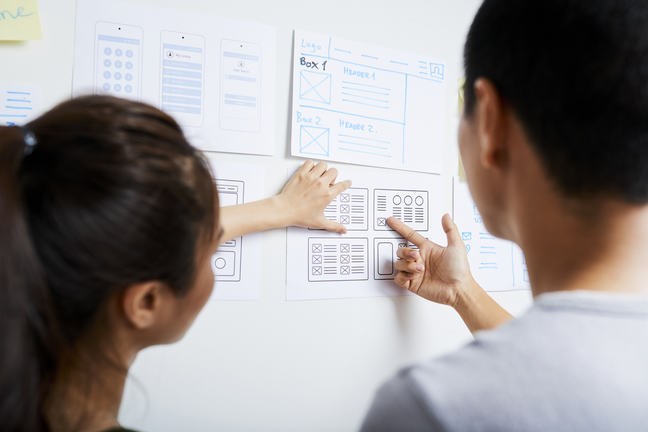 Team members collaboration on whiteboard