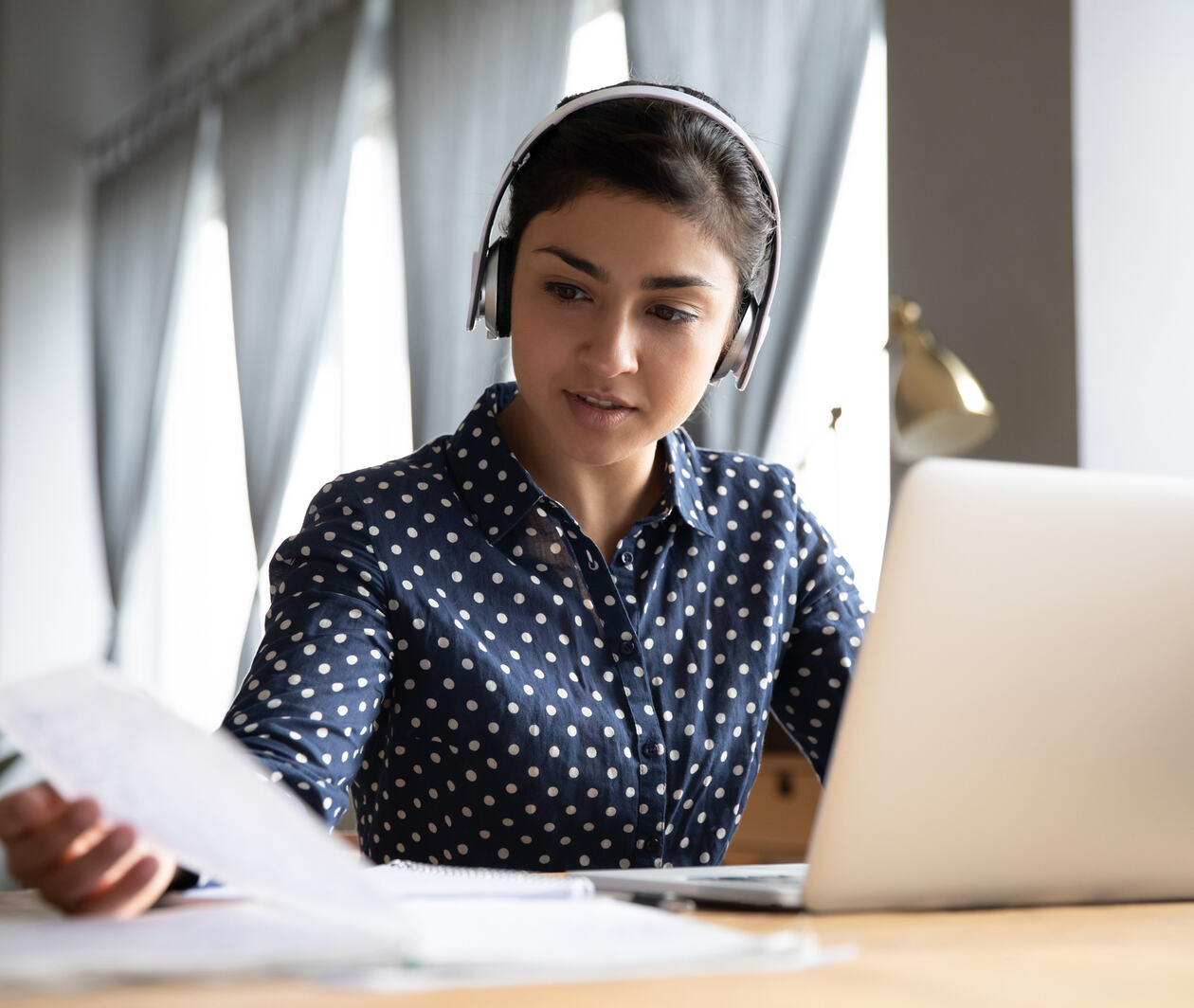 Woman studying on her laptop