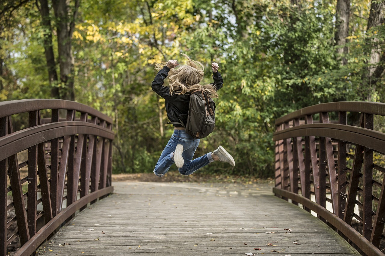 Young woman jumping with excitement