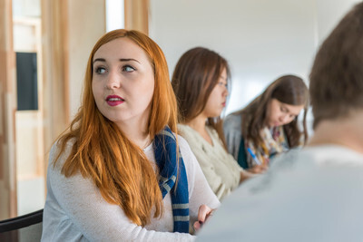 Students learning in a classroom