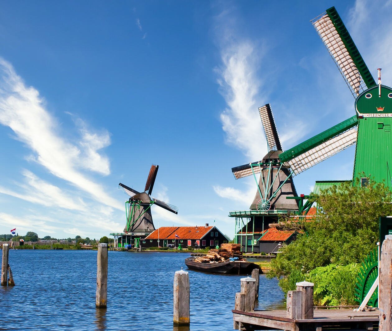 Windmills looking over the water