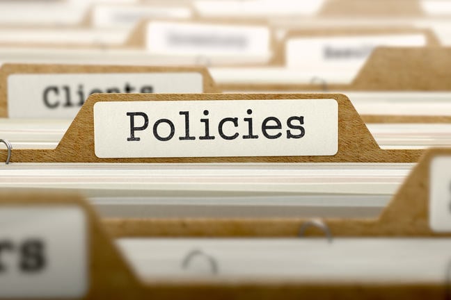 A paper folder with the label "policies".
