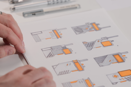 A selection of proportionate communication design ideas drawn in marker and pen.