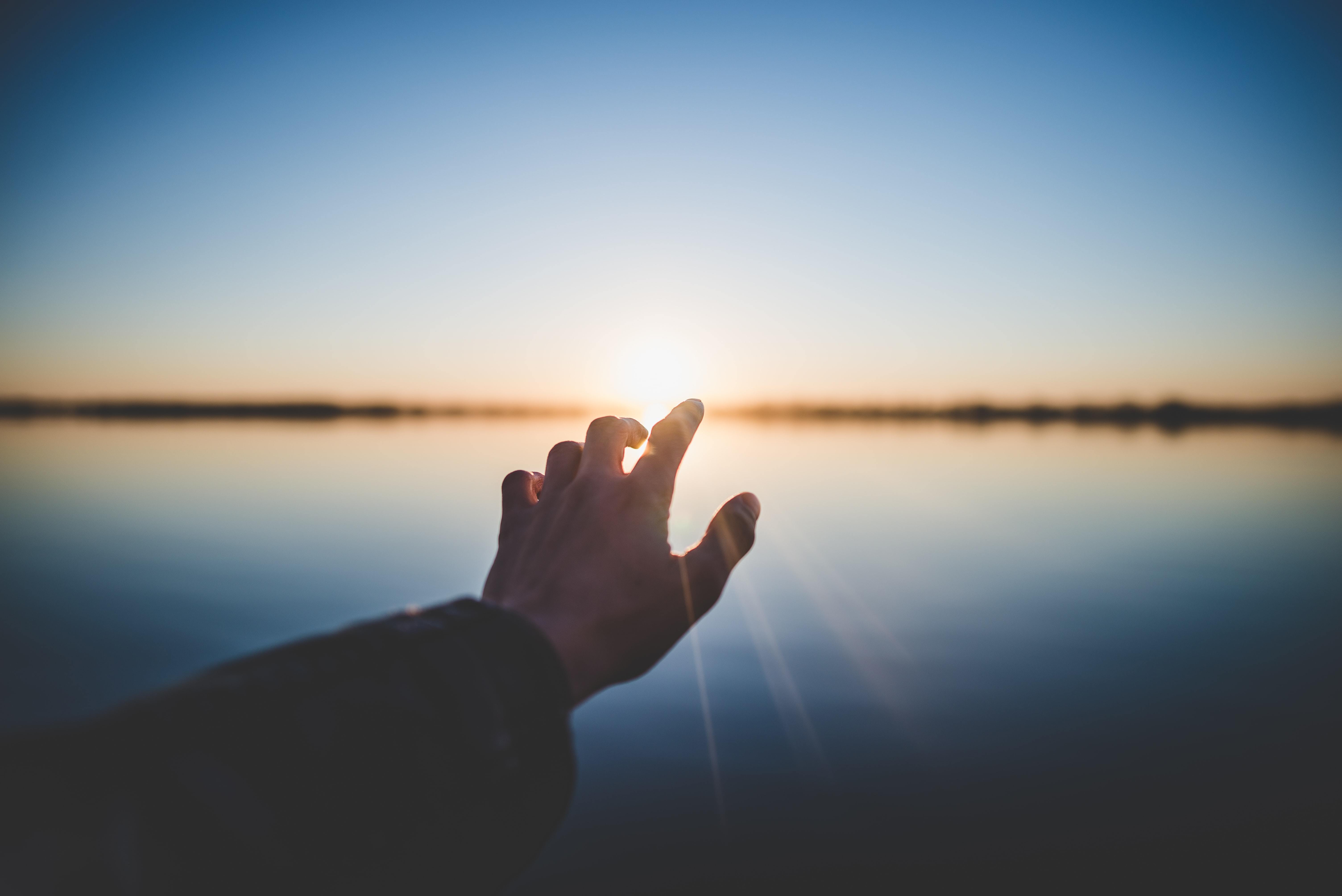 Man with his hand outstretched