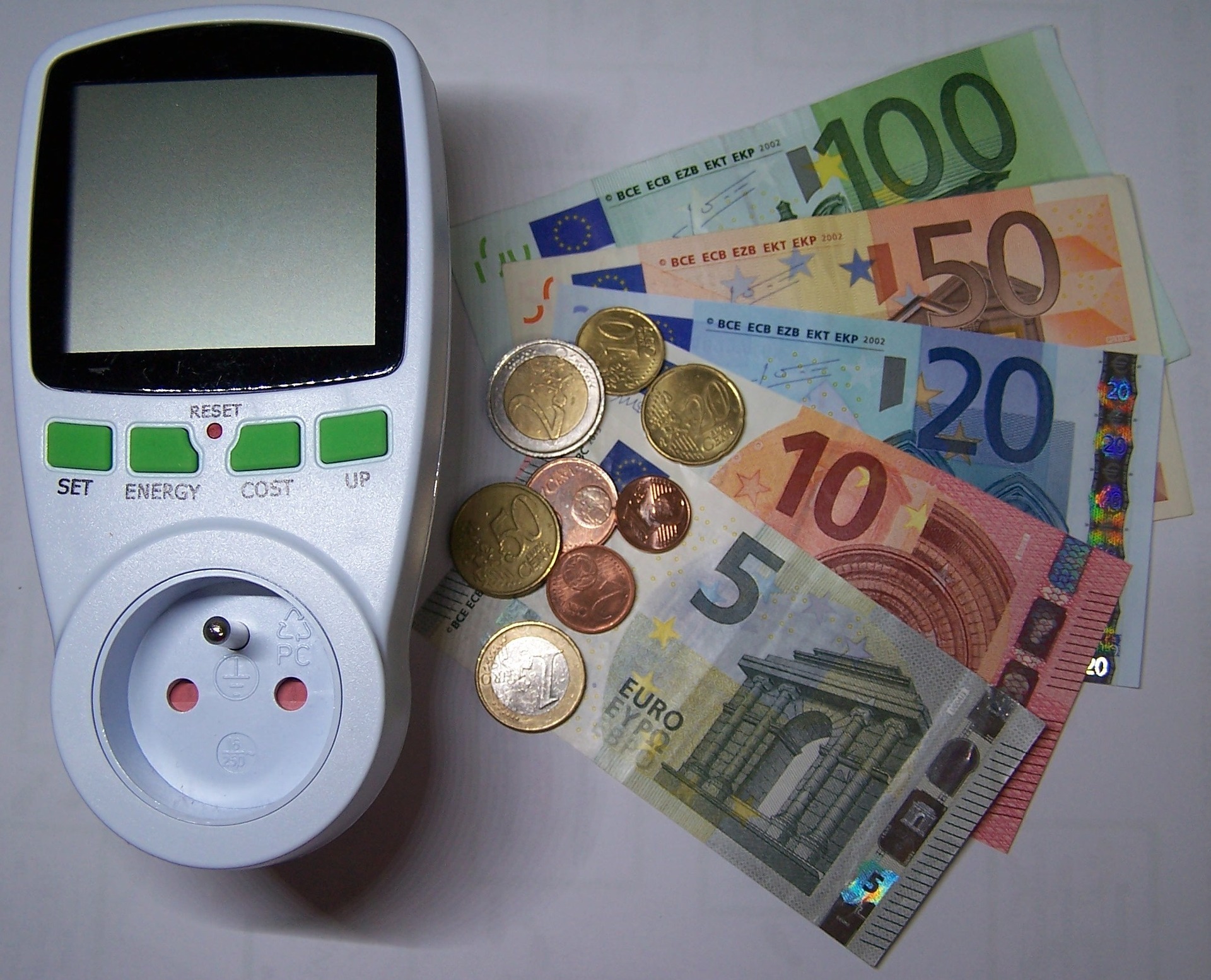 Photo of energy meter and money