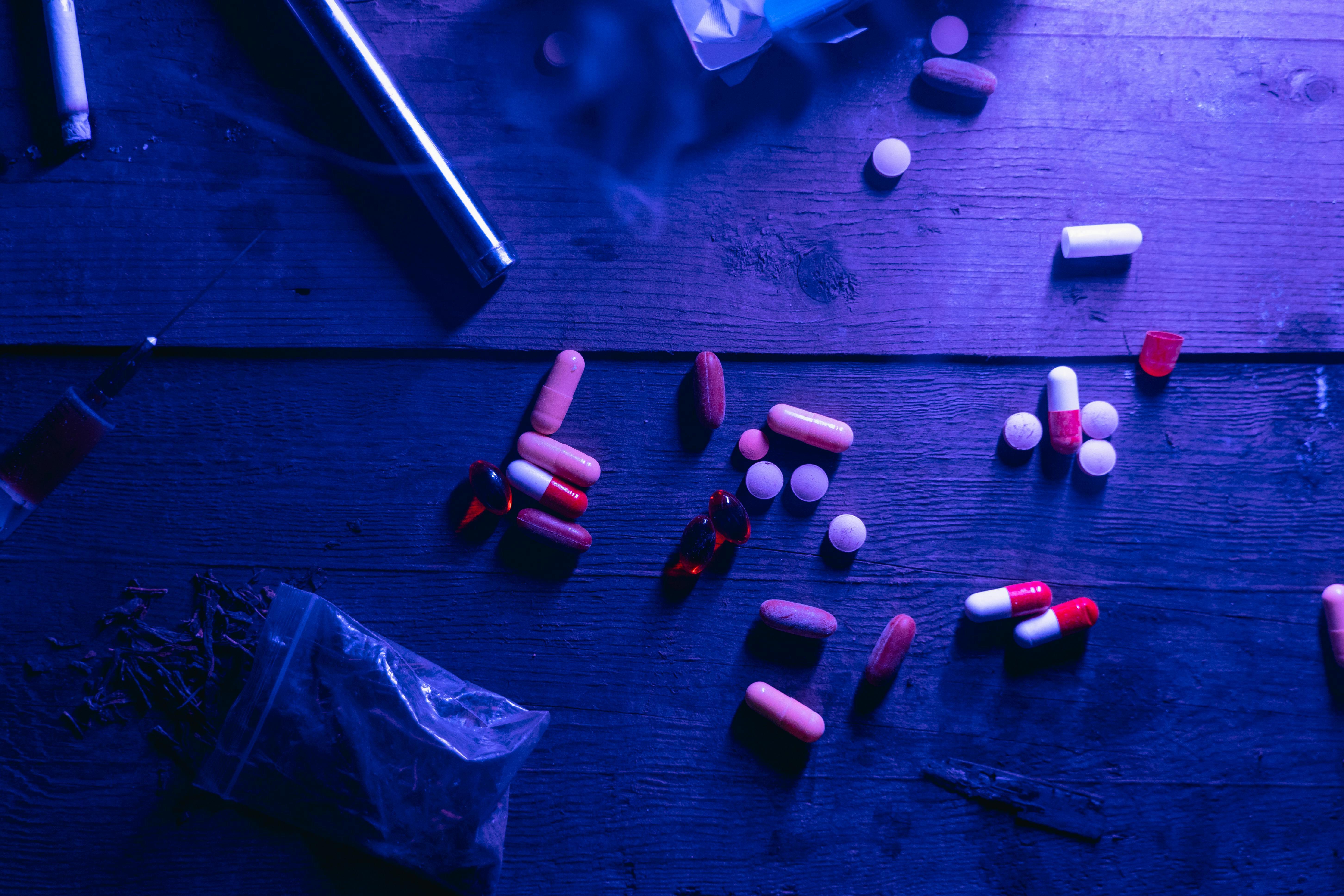 Photo showing drugs and cannabis on the floor