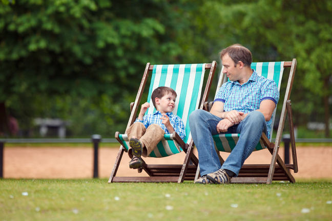 Adult and child talking to each other
