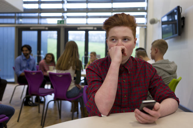 A young person looking concerned.