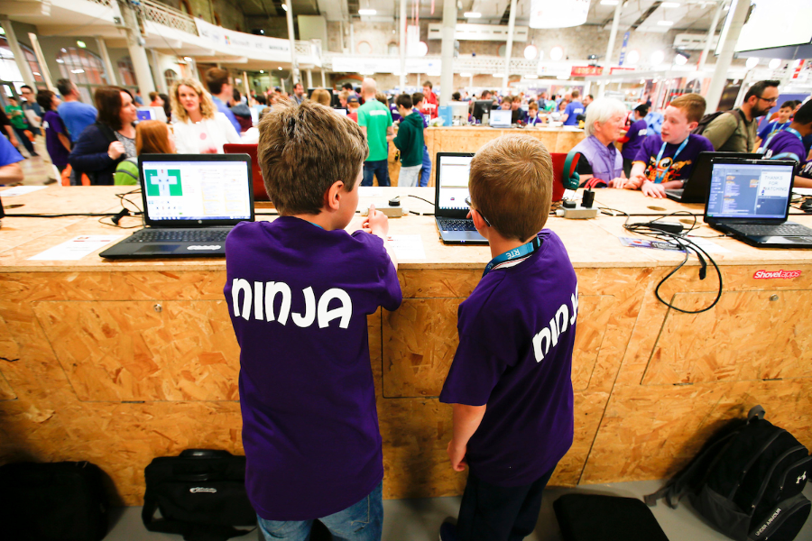 Two children at laptops