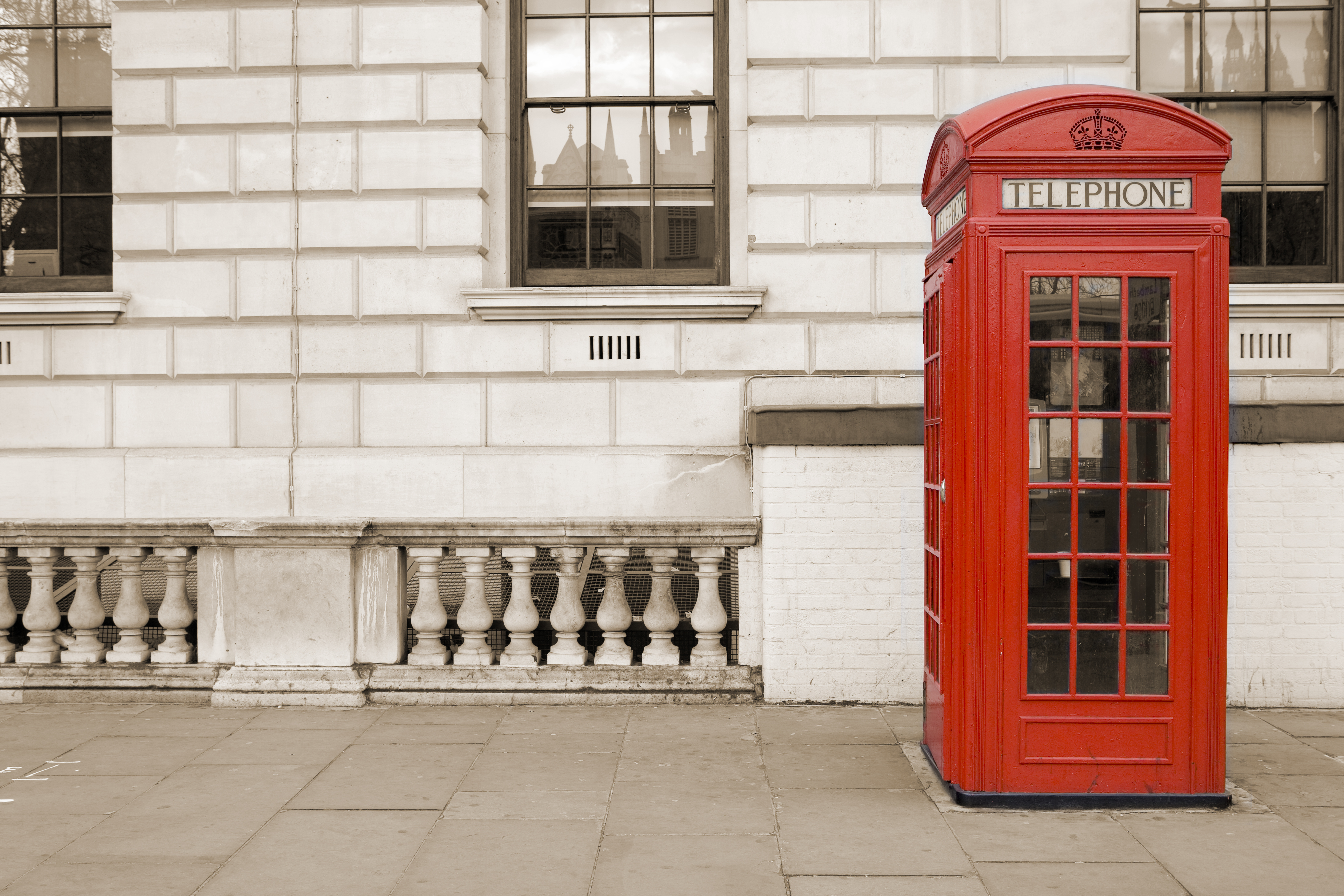 A red telephone box in Whitehall, London.