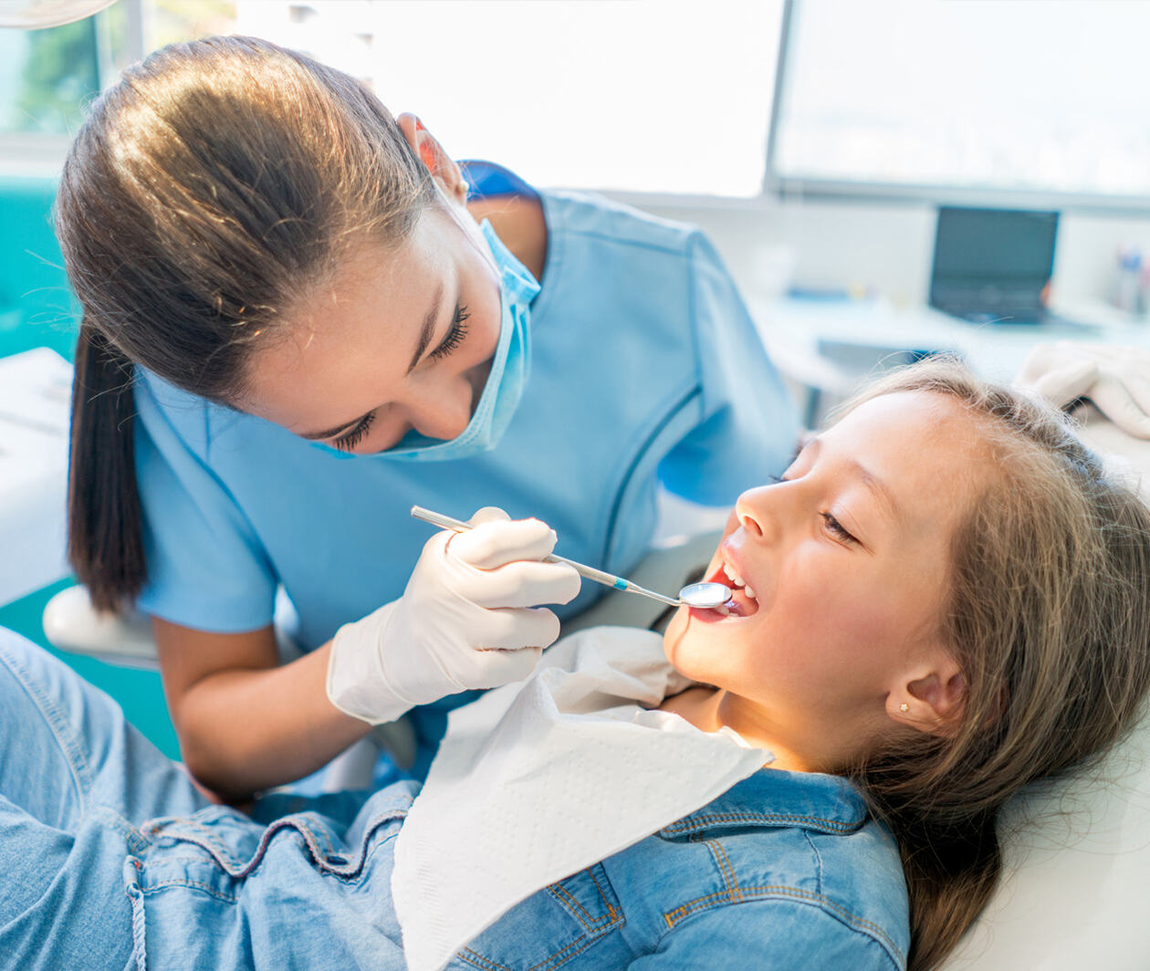 A young child at the dentist.